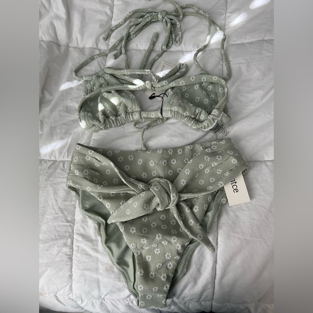 Montce swim suit. Top medium bottoms small- removed tags but never worn
